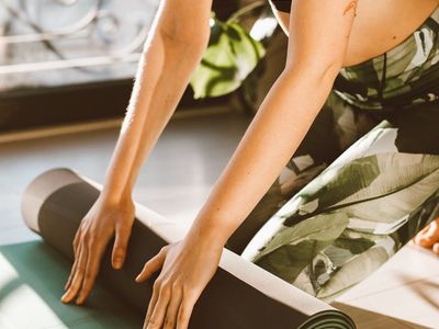 Soft morning sunlight hitting a rolled up yoga mat.